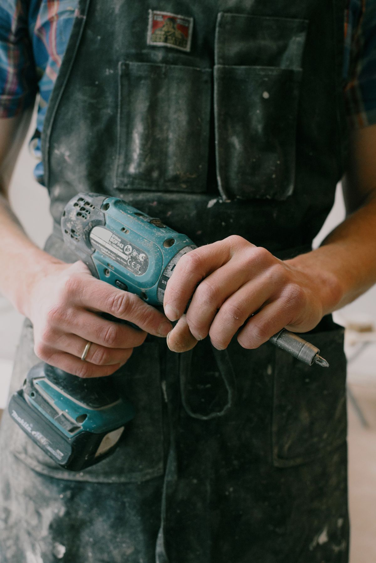 Factory-trained IRONHAUS technician with power tools